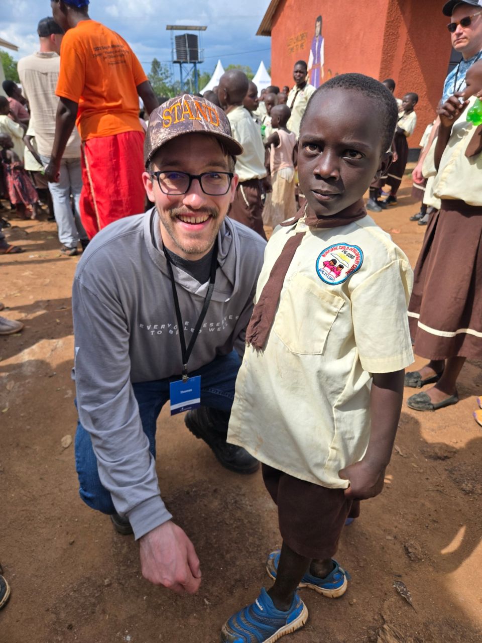 Thomas with Elijah during a visit to Uganda